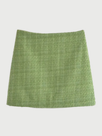 Green tweed set with heart buttons – stylish and versatile.